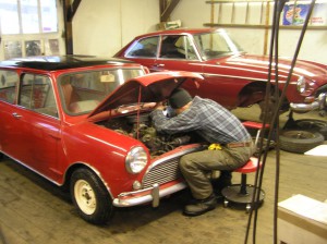 OLYMPUS DIGITAL CAMERA Patrick inspects a '67 Cooper "S"