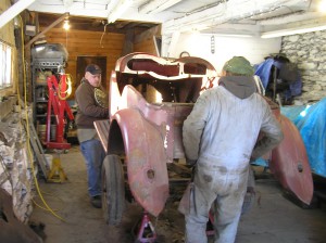 TD lift off John & Steve pull a TD body tub off the chassis with help from Patrick