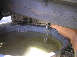wet TD draining water from an MG TD engine