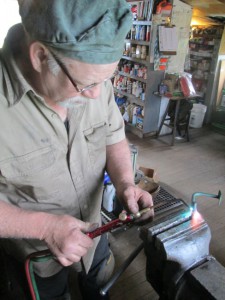 Butch repairs Healey throttle linkage